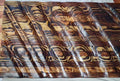 Custom waving wood wall art panel with dramatic torch-finished grain pattern, hand-built and sealed