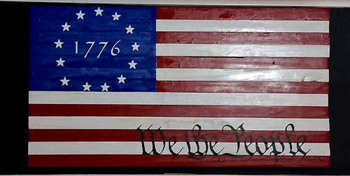 Handcrafted wooden Betsy Ross flag with 13 stars, 1776 date, and We the People script