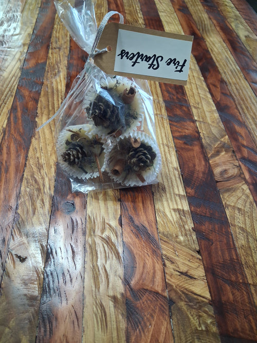 Artisan Fire Starters 3 Pack close up showing pinecone and botanicals