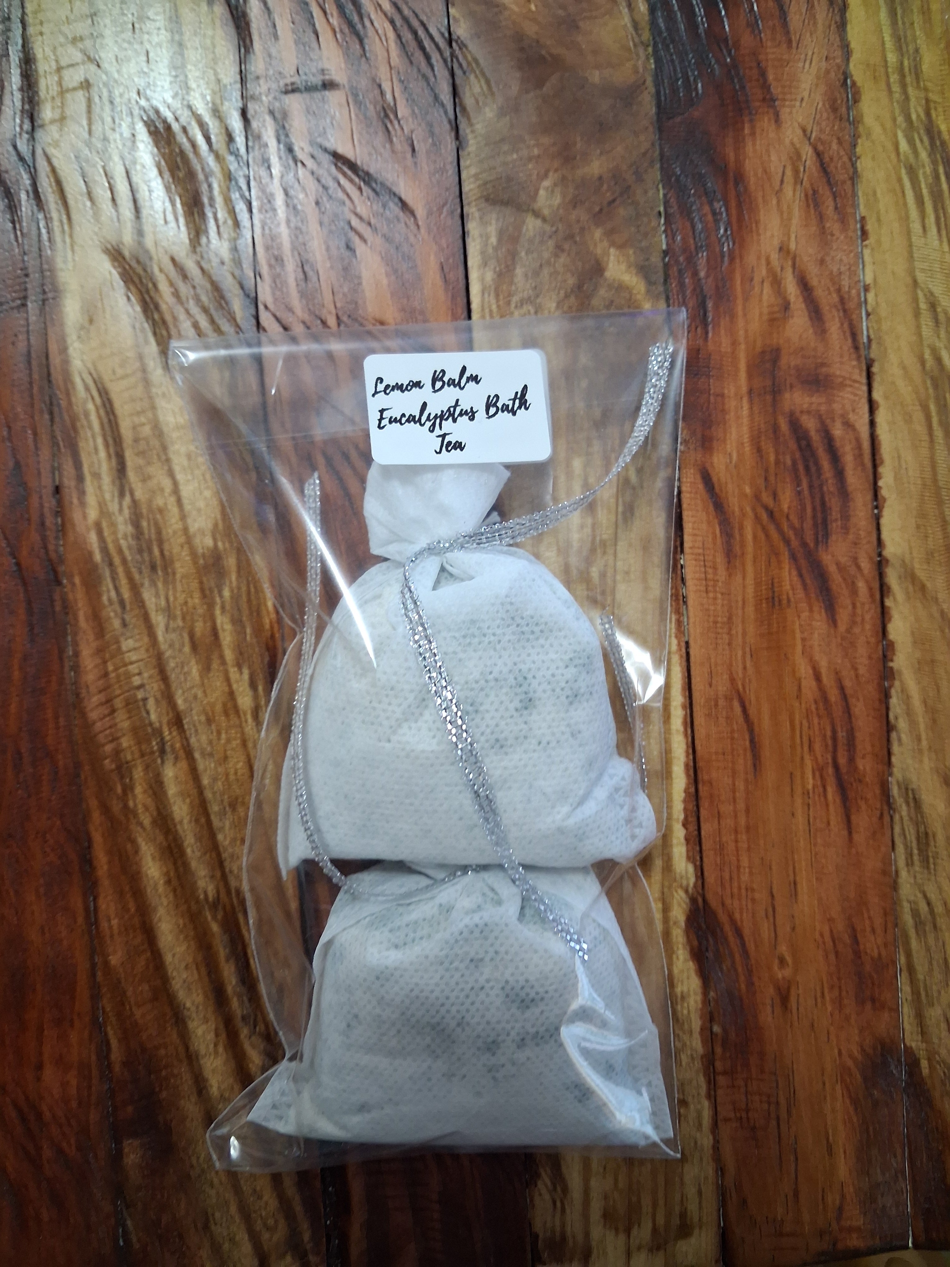 Lemon Balm Eucalyptus Bath Tea 2 Pack in clear packaging with hand-tied sachets